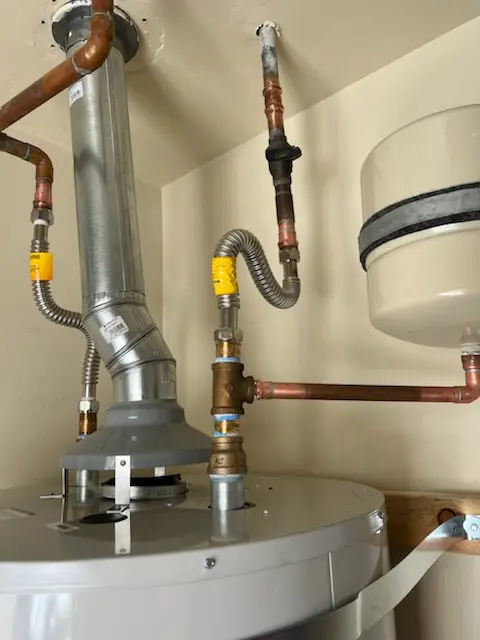 Water heater installation and plumbing repair in White City